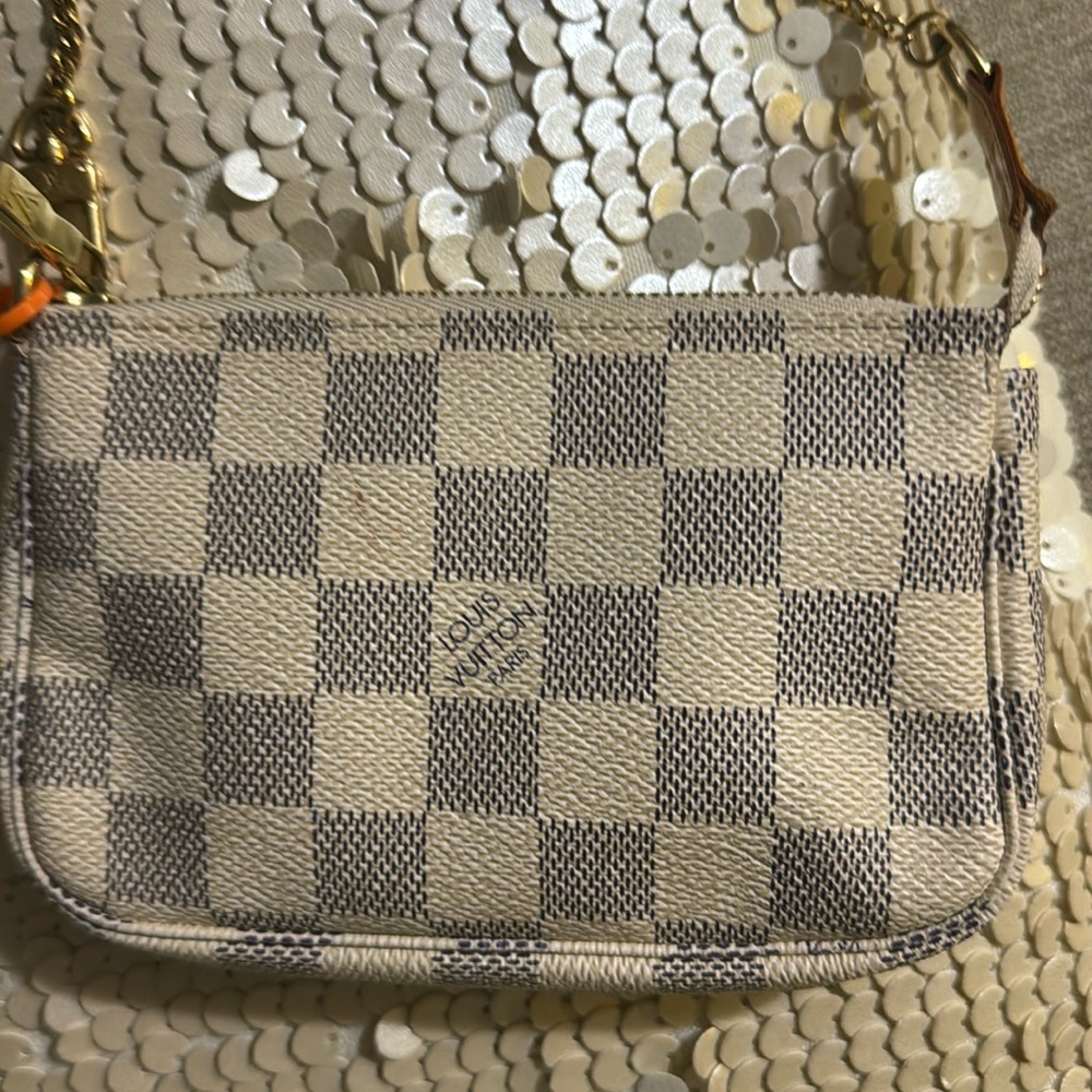 - Mini logo Louis Vuitton authentication
